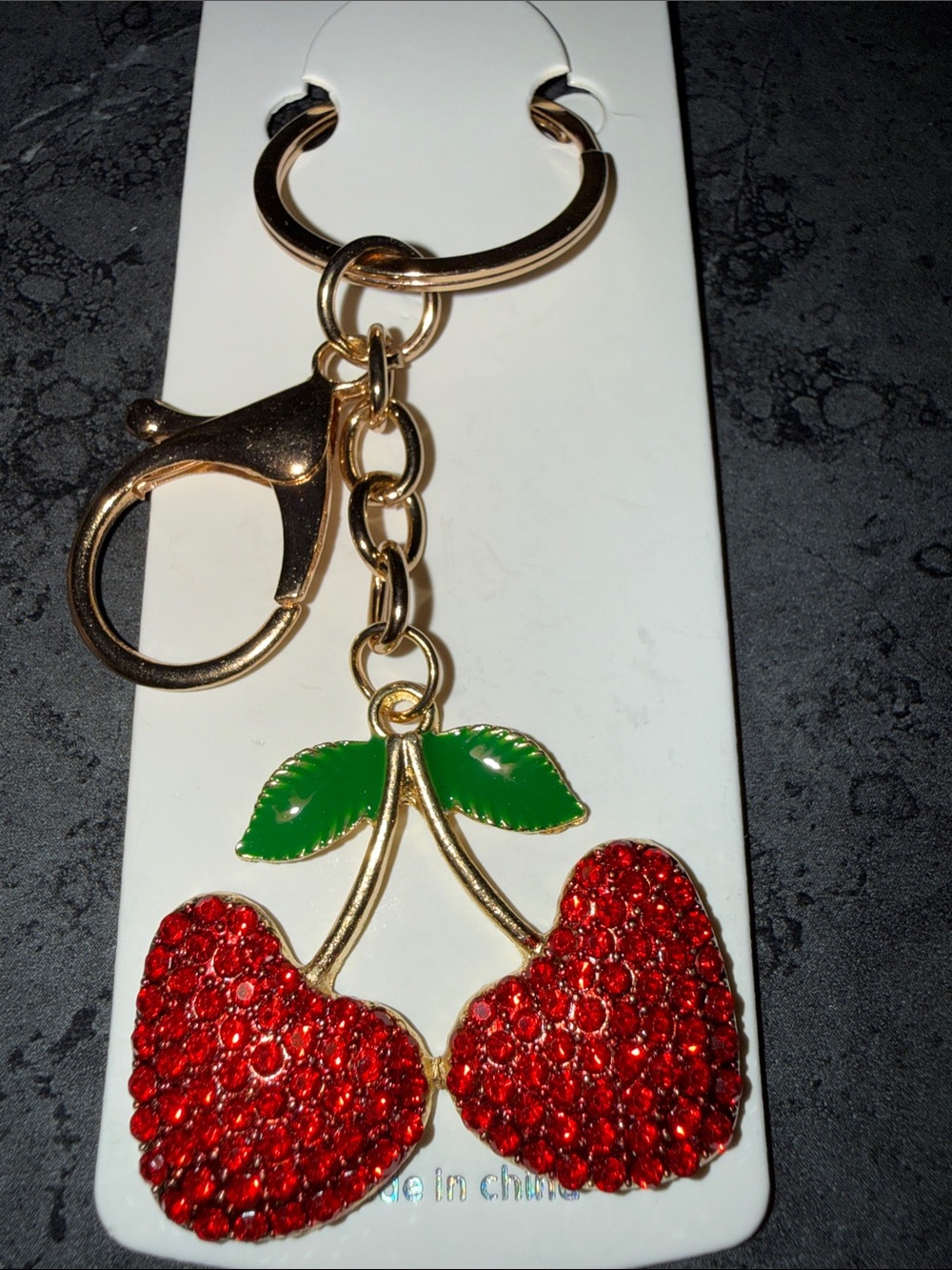 Gold-Tone Red Crystal Cherry Keychain with Green Enamel Leaves